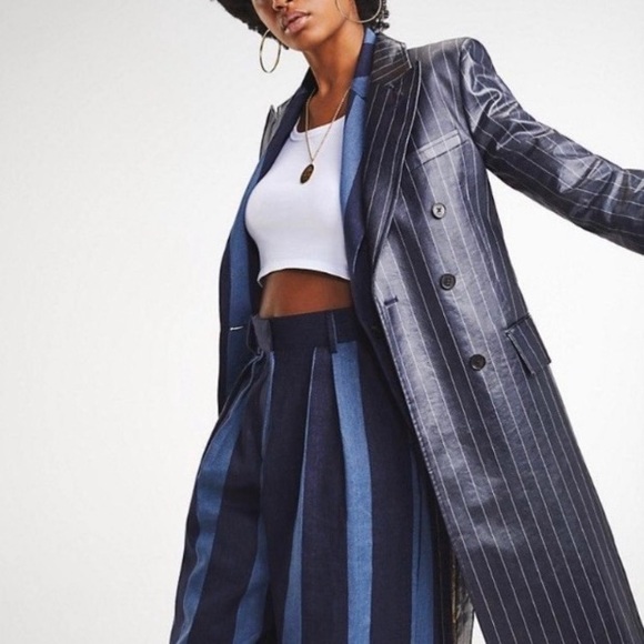 Tommy X Zendaya runway pinstripe trench coat
